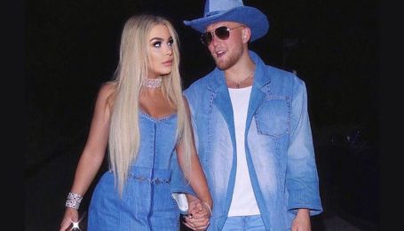 tana and jake in denim outfits holding hands